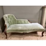 A Victorian walnut chaise long upholstered in a pale green velvet (back at fault)