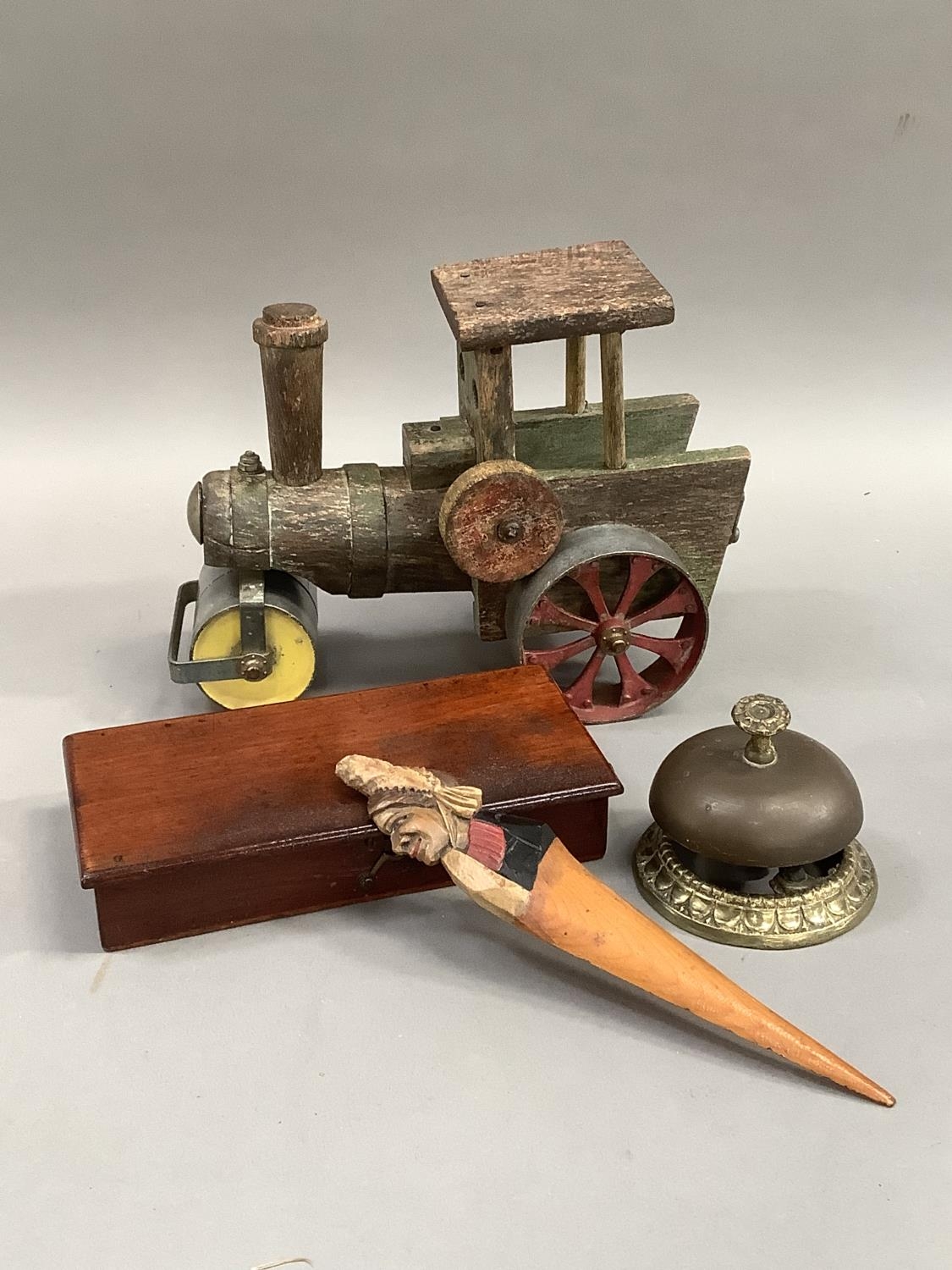 A wooden and steel model of a traction engine together with a counter bell, a mahogany boxed set