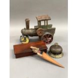 A wooden and steel model of a traction engine together with a counter bell, a mahogany boxed set