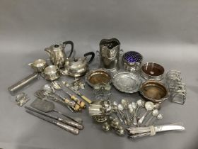 Silver plated ware including a planished four piece tea service, 1920's soda and stand, Jersey jug