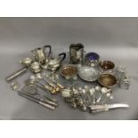 Silver plated ware including a planished four piece tea service, 1920's soda and stand, Jersey jug