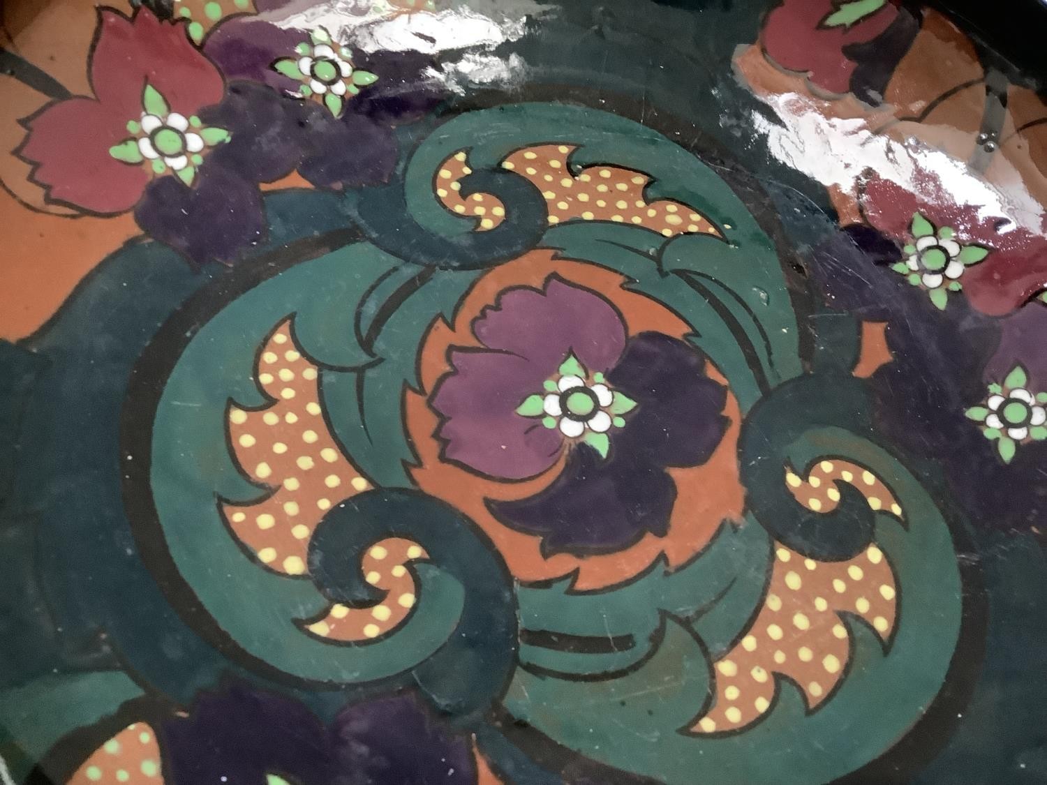 A twentieth century Art Deco glass bowl, the interior painted with purple flowers with foliage on an - Image 3 of 3