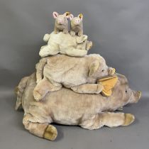 A collection of five Steiff pigs comprising an extra large 80cm pig, a large 40cm pig, a medium 25cm