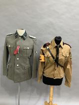 A reproduction WWII style German Army Deutsche Wehrmacht auxiliary helper's brown shirt, necktie,