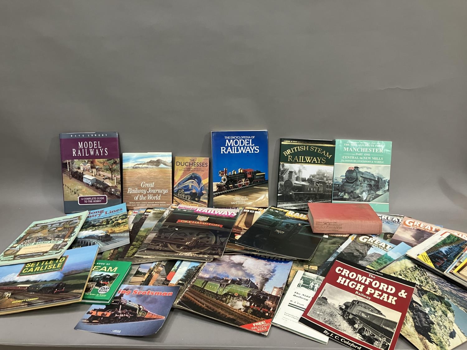 A collection of railway reference books, guides and pamphlets, along with a consecutive collection