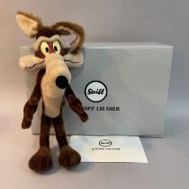 A Steiff mohair plush figure of Warner Bros Cartoon’s ‘Wile E. Coyote’, number 216 of 1500, 36cm