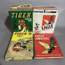A selection of comic annuals, including Eagle, Tiger and Lion