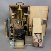 An early 20th century cased Carl Zeiss Jena microscope with three Zeiss lenses, four Zeiss eyepieces