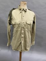 A US Army Transportation Corp Shirt with 1st Infantry & Service patches and brass collar badges,