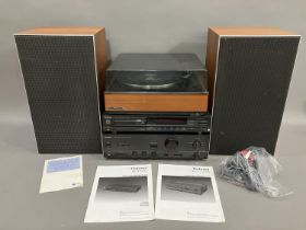 A Technics SU-V460 stereo integrated amplifier, a Technics SL-P200 CD Player, a Garrard AP 76