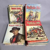 A selection of annuals from the 1950s including robin hood, billy the Kid and Buffalo Bill
