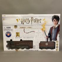 A battery operated Harry Potter Hogwarts Express remote control train set by Hornby Lionel,