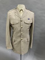 An REME service tunic with shirt and tie