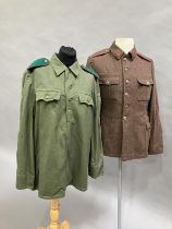 A Bulgarian military battle dress blouse with green shirt