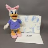 A Steiff mohair plush figure Disney’s cartoon character ‘Daisy Duck’, number 700 of 2000, 25cm high,