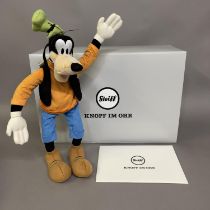 A Steiff mohair plush figure of Disney’s cartoon character ‘Goofy’, number 110 of 2000, 36cm high,