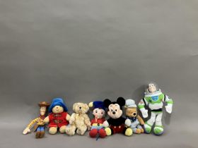 A collection of plush toys from Star Bean, Russ Berrie and others, including Disney’s Toy Story ‘