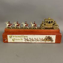 A Lesney Products Coronation Coach, boxed, with Queen Elizabeth figure and all chains to carriage