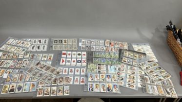 Forty cigarette card sets and part sets, in plastic sleeves including Player's Association Cup