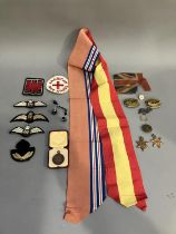 A collection of three RAF cloth badges, a Burma Star medal, a 1939-1945 Star Medal, two Bristol