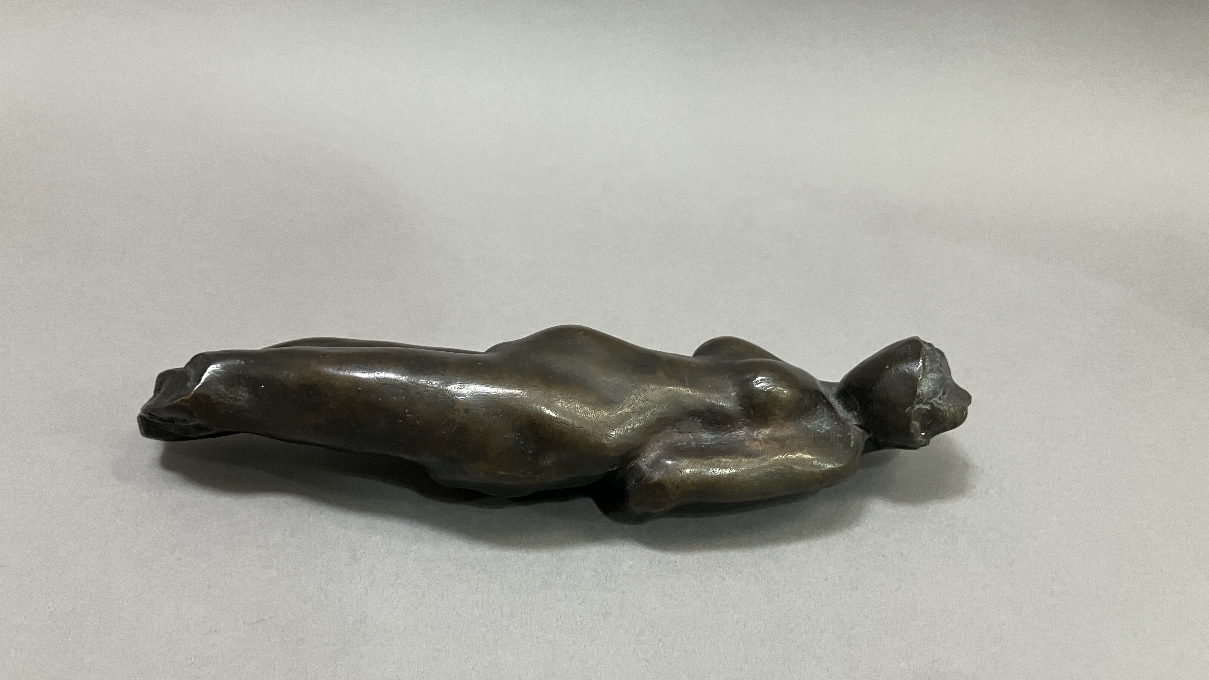 British School mid 20th century, A bronze female nude figure, reclining, 22cm long - Image 2 of 9