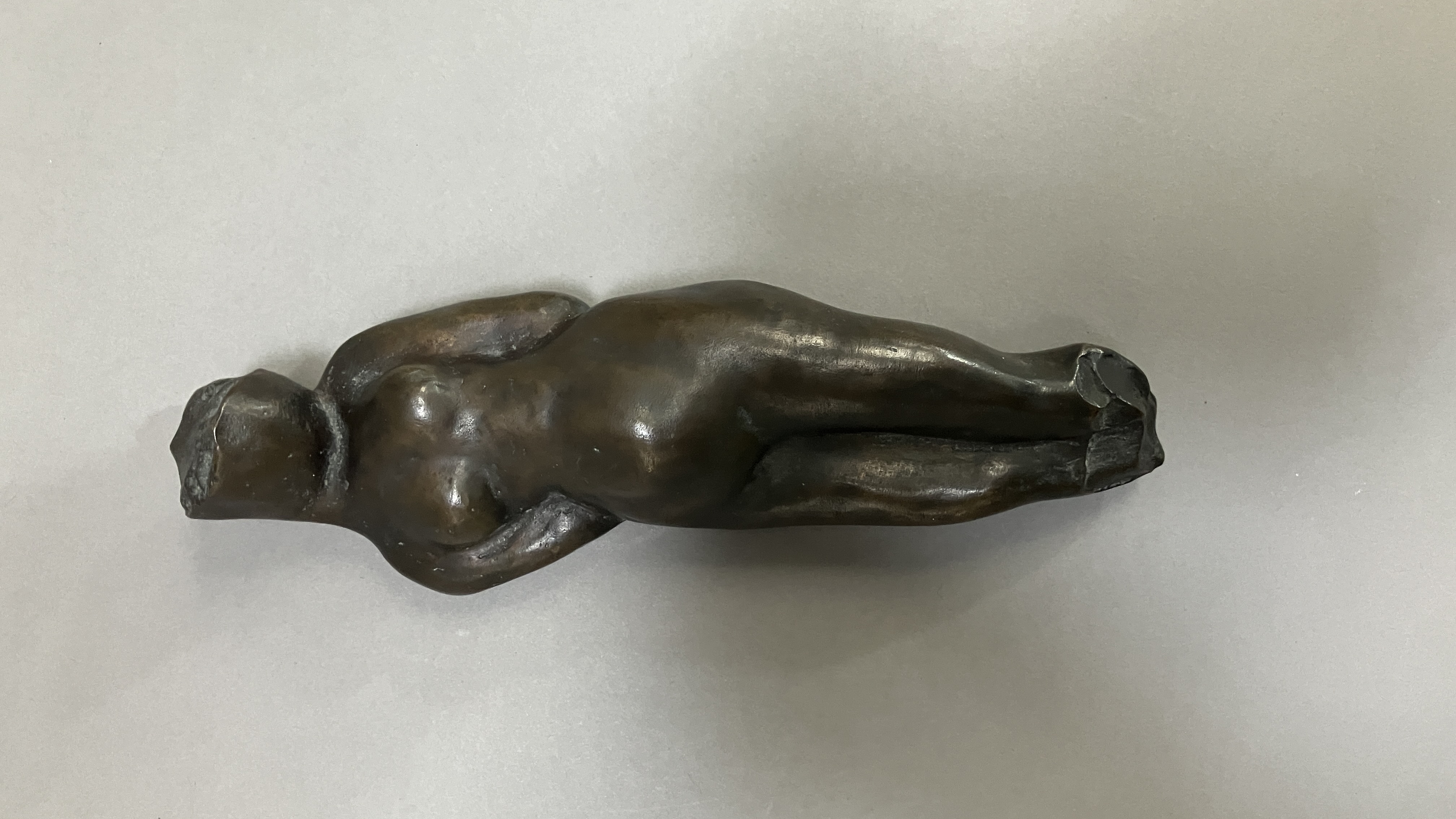 British School mid 20th century, A bronze female nude figure, reclining, 22cm long - Image 3 of 9