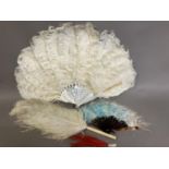 A white ostrich feather fan, the monture of mother of pearl with a hint of pink, overall height