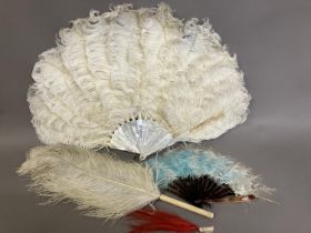 A white ostrich feather fan, the monture of mother of pearl with a hint of pink, overall height