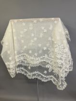 Antique Lace: a late 19th century Honiton lace veil, bobbin appliqué on machine net, with a