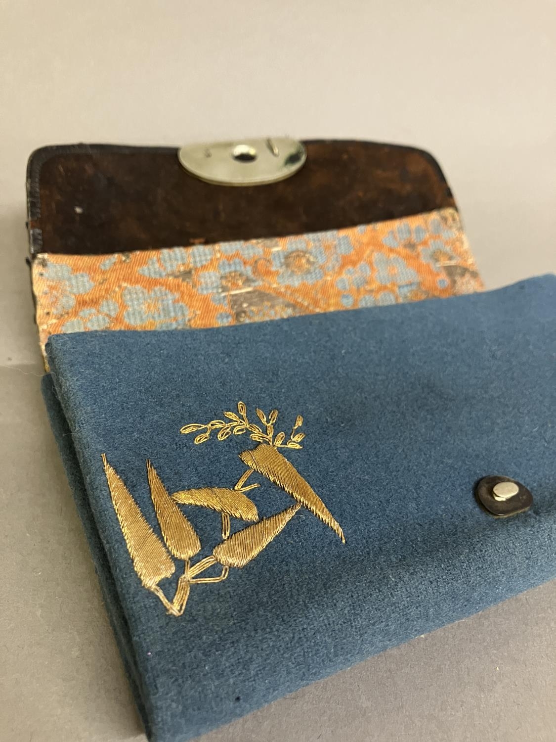 A 19th century Japanese purse or pouch, in teal wool, applied with a sun or moon in beige wool, - Image 3 of 5
