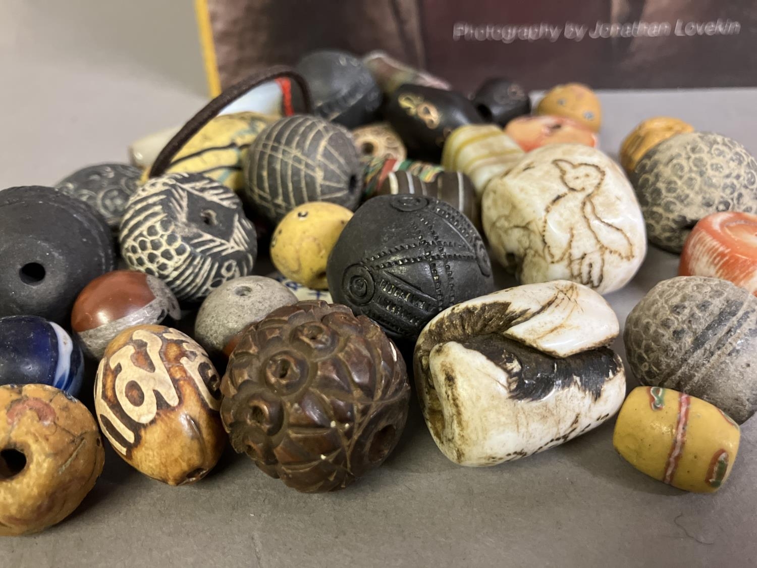 Trade beads: a good selection of beads, various sizes and shapes, many black or grey, carved, others - Image 2 of 4