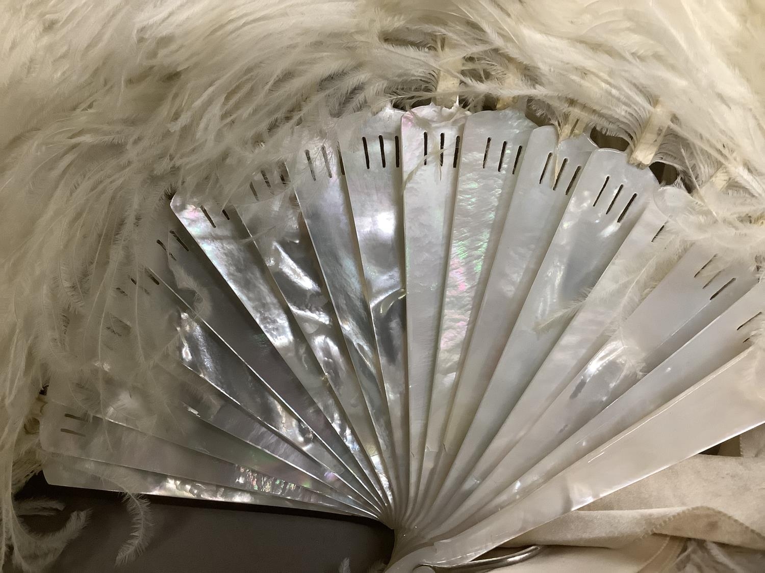 A large and fluffy white ostrich feather fan, the monture of white mother of pearl, fitted with a - Image 3 of 5