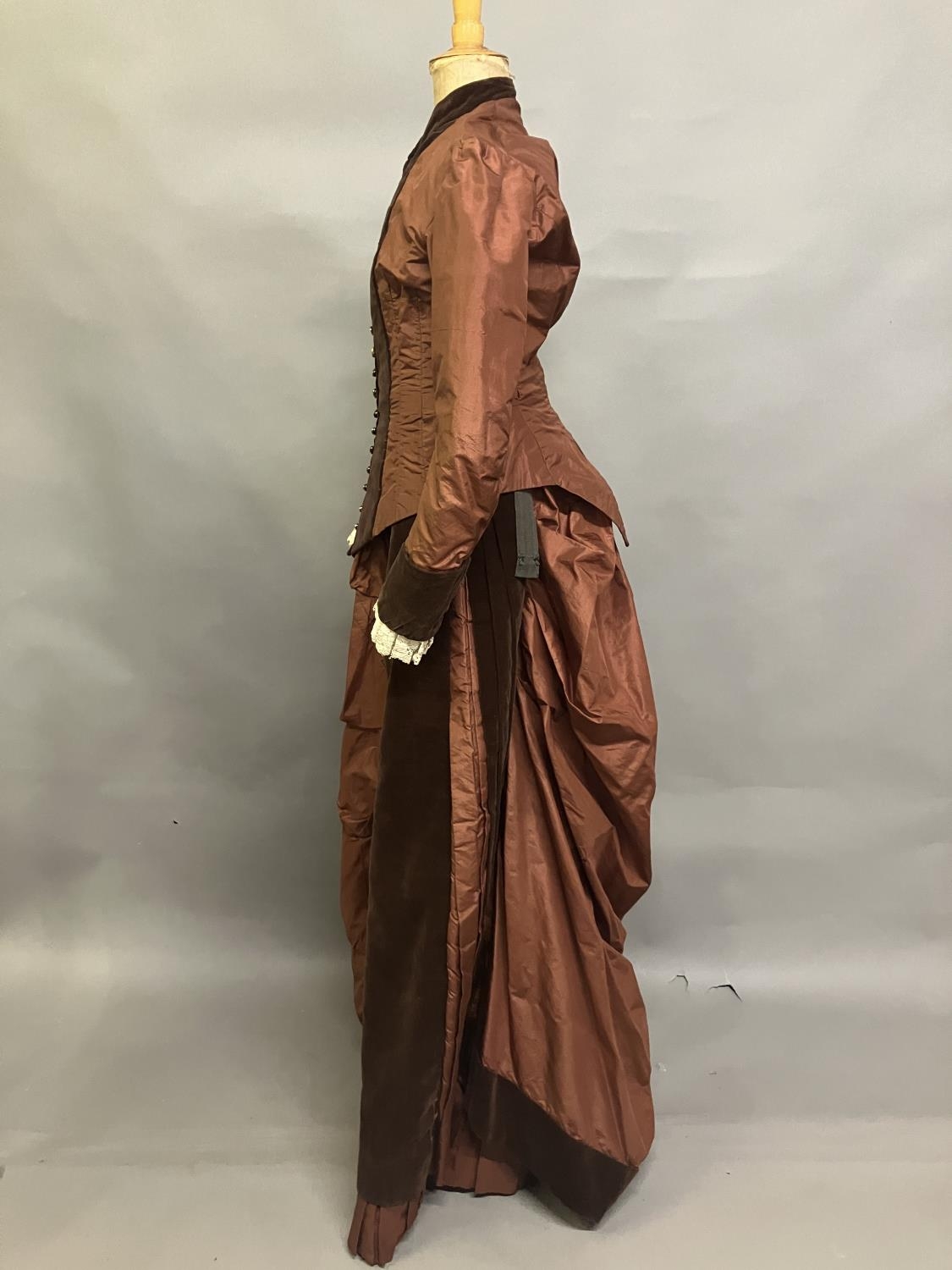 A c 1880’s century two piece costume, mid-brown silk and darker velvet, the bodice with straight - Image 5 of 6