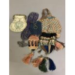 Antique bags and purses including miser’s purses: comprising a small teal bag with gold base metal