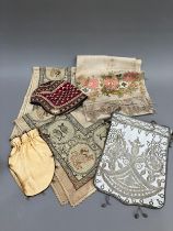 World textiles: an assortment of items comprising a square cloth embroidered in silks with a deep,