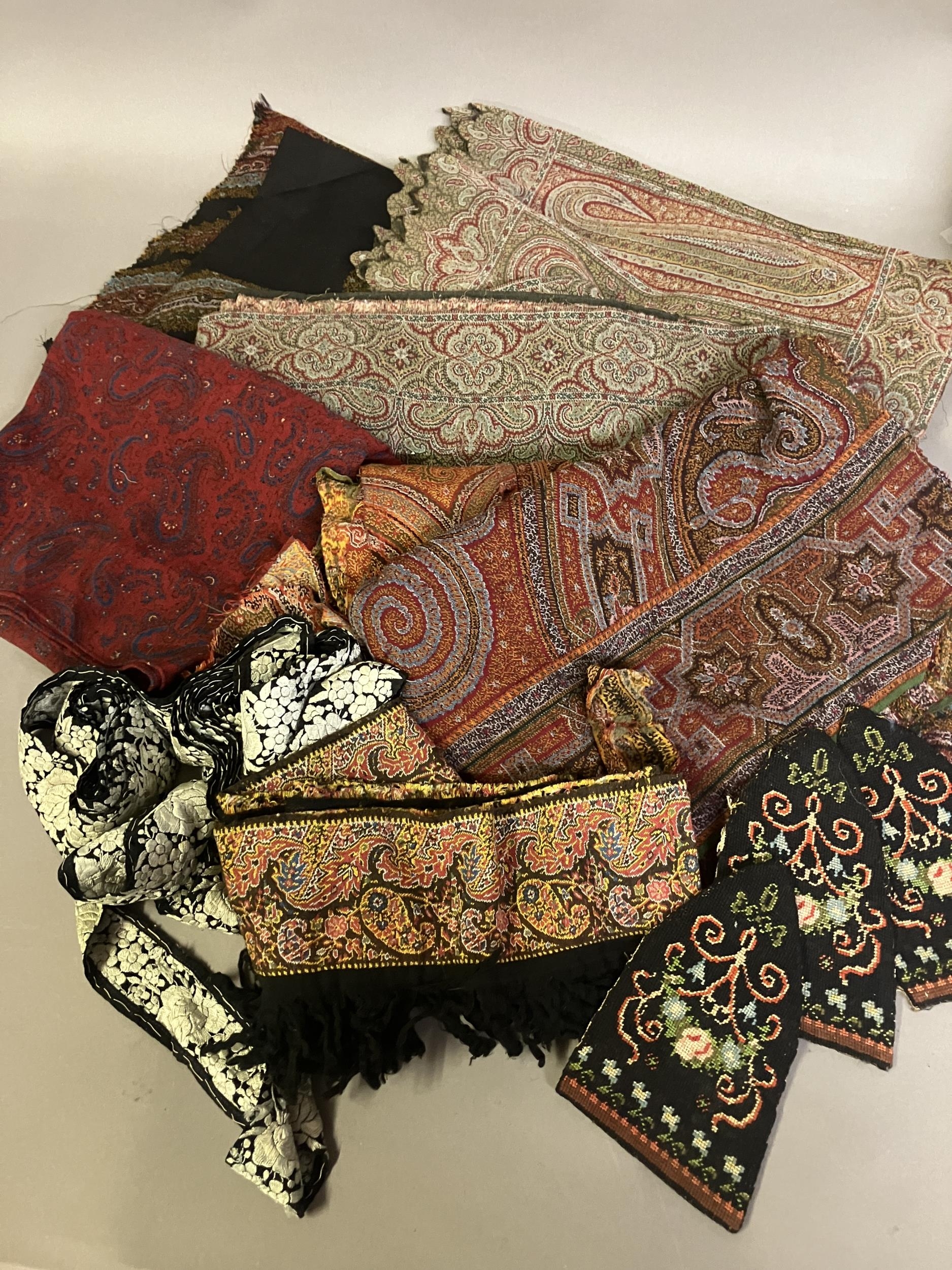 19th century borders and sections of paisley and Indian woven shawls, different design, one