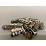 Trade Beads: sixteen various beads in varying sizes and colours, some possibly dZi, (Shipping