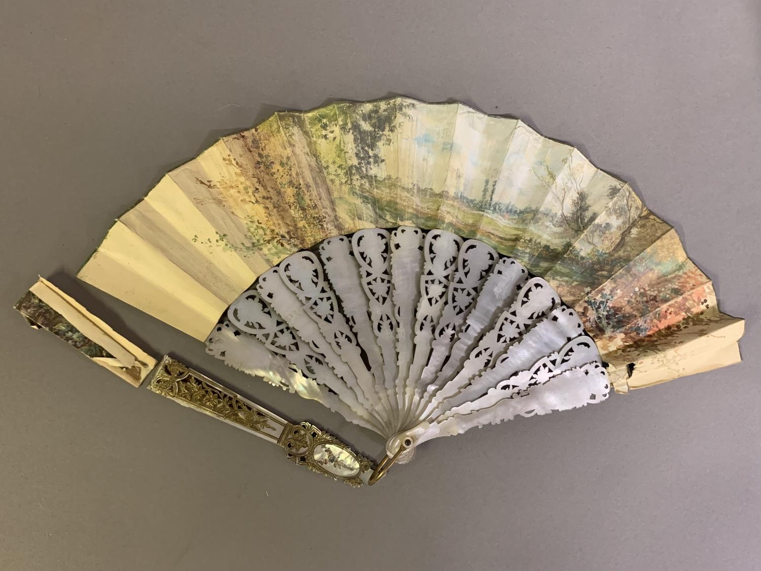 Three 20th century fans: the first, in white mother of pearl, a pastiche of an 18th century fan, the - Image 9 of 9