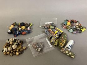 Trade beads: a selection of beads to include millefiori, different sizes and shapes, plus oddments