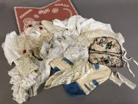 Antique lace, knitting and crochet: two lace items in the form of cap backs, with additions, the