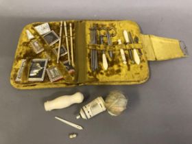A Victorian fitted case for needlework tools, mustard velvet, containing various hooks, tweezers,