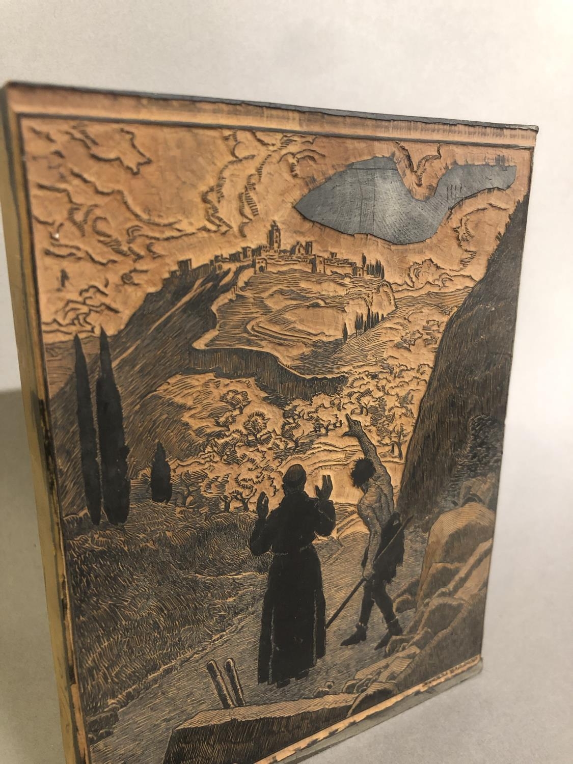Antique French wood printing blocks, one figurative, with a monk being guided to a hilltop fortified - Image 3 of 4