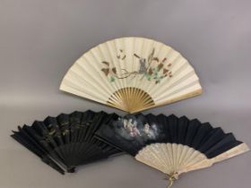 Three fans from the 1890’s: a large wood fan with cream cotton leaf, painted with Pierrot kneeling