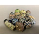 Trade Beads: a quantity of patterned beads in subtle colours, various sizes and shapes to include