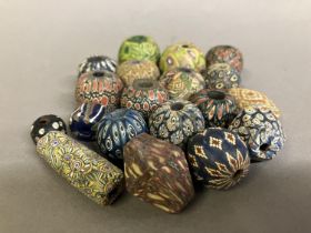 Trade Beads: a quantity of patterned beads in subtle colours, various sizes and shapes to include