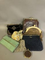 A selection of 19th and 20th century bags: a good Art Nouveau leather bag, embossed on the front