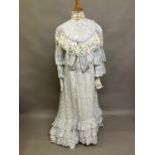 An Edwardian summer two-piece ensemble, c 1903, in printed cotton, pale blue flowers and leaves on a