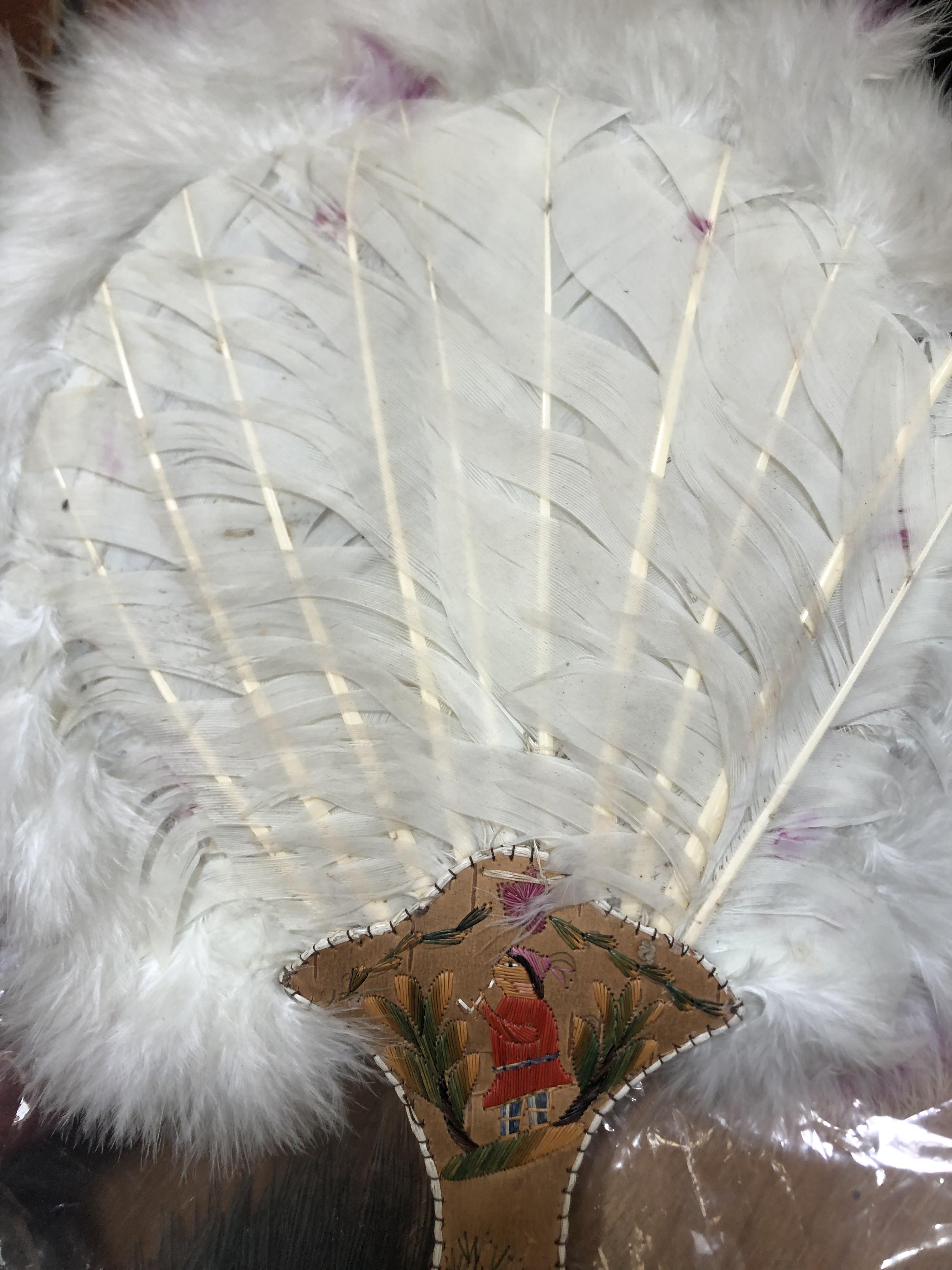 A North American Indian feather fixed fan, 19th century, applied with a small bird, the shaped - Image 7 of 8