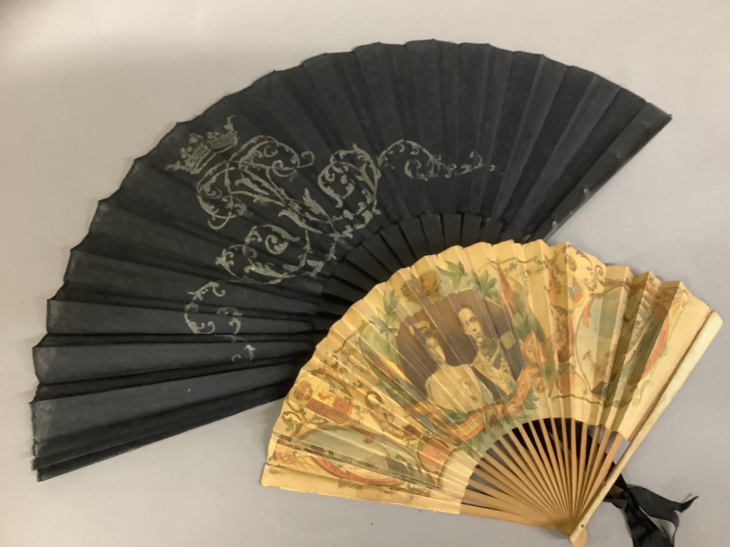Royal Interest: a paper fan printed with a portrait of King Alfonso XIII and Queen Victoria of