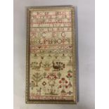 A 19th century needlework sampler worked in bands of the alphabet, some in the Scottish embroidery